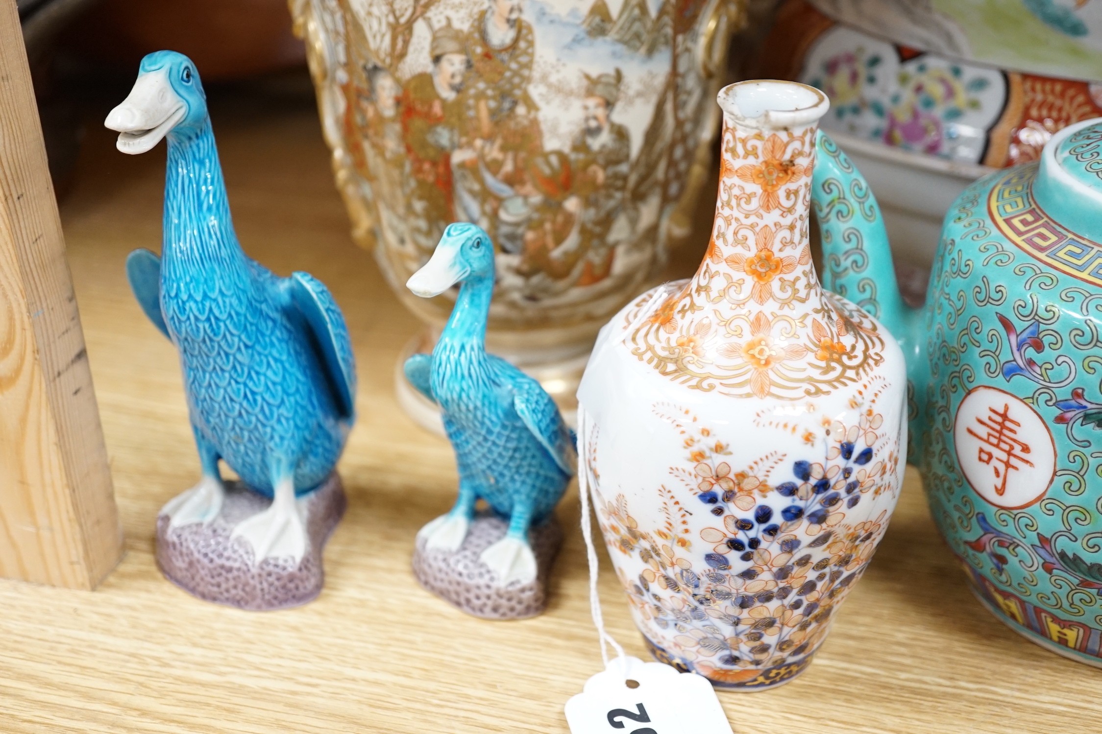 Japanese ceramics to include a Satsuma vase, 25 cm high, a Kutani style tureen and cover, a koransha bottle vase, together with a Chinese tea pot and two figures of ducks